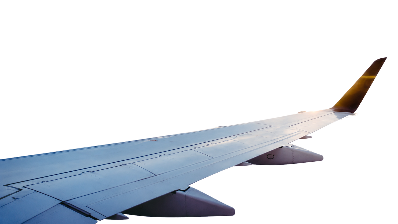 View of an airplane wing above the clouds